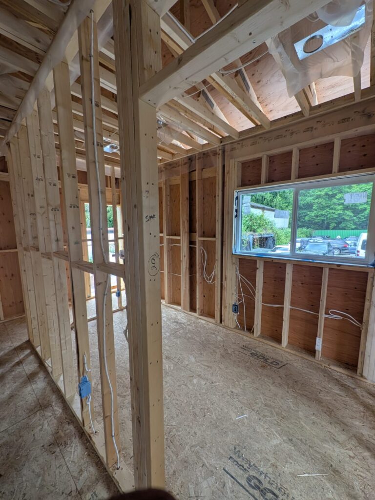 Framing of Surrey intergenerational home project from interior.